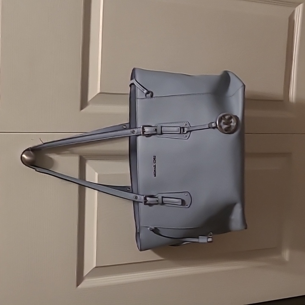 Michael kohrs east west voyager bag